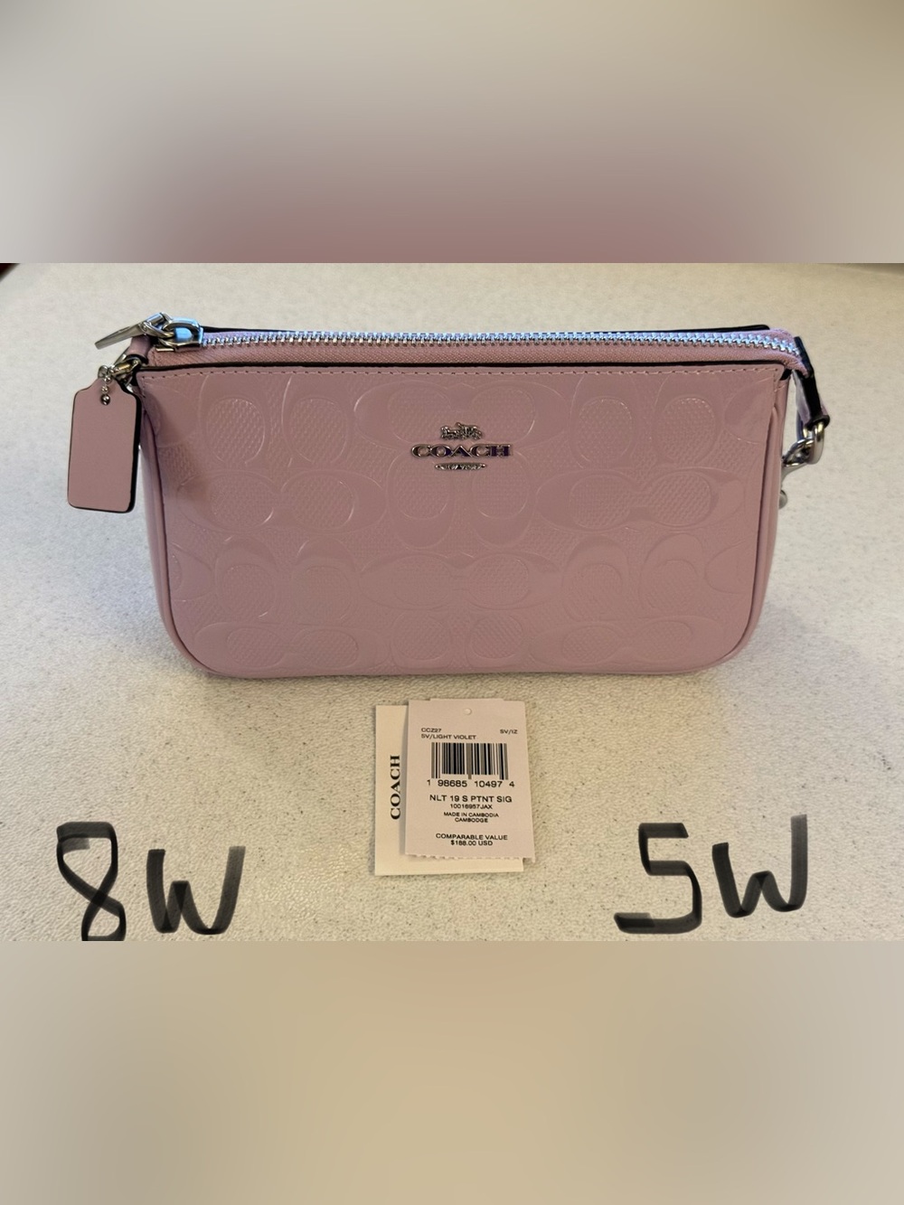 Coach Pink Embossed Signature Zip Wristlet